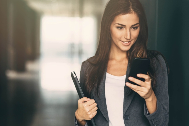 Businesswoman Checking Her Phone